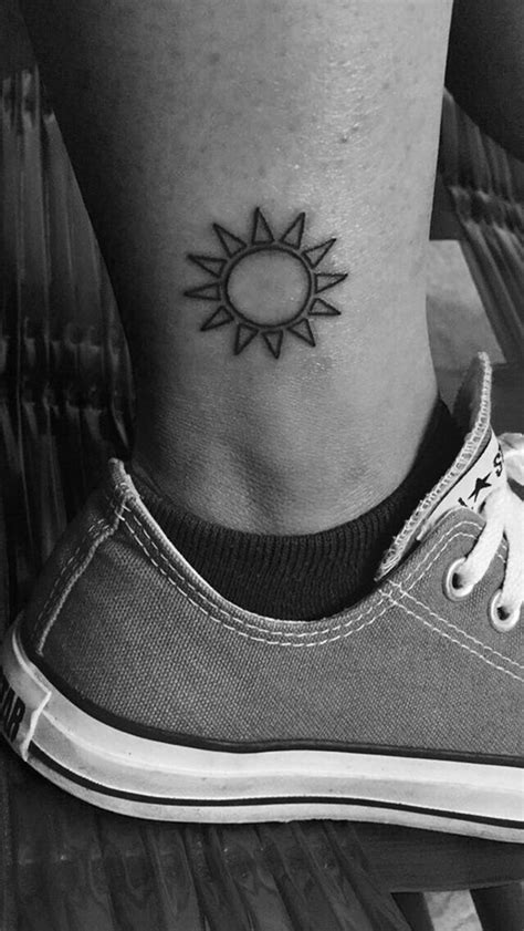 Instead, try a simple sun tattoo design. 175+ Warm and Bright Sun Tattoos