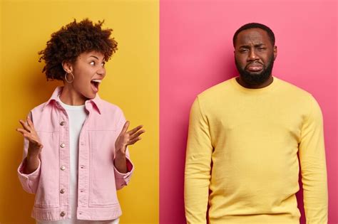 Free Photo Black Couple Arguing Annoyed Curly Haired Woman Gestures Angrily Displeased Man