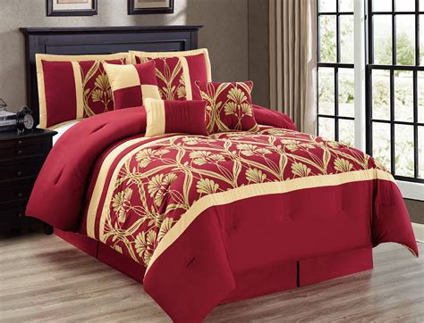 Rest blissfully on plush comforter sets. 7-Piece Perris Burgundy/Gold Comforter Set