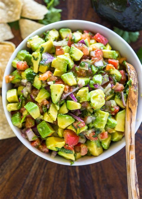 Peel avocadoes and tomatoes and dice into small chunks. The Best Avocado & Tomato Salsa | Gimme Delicious