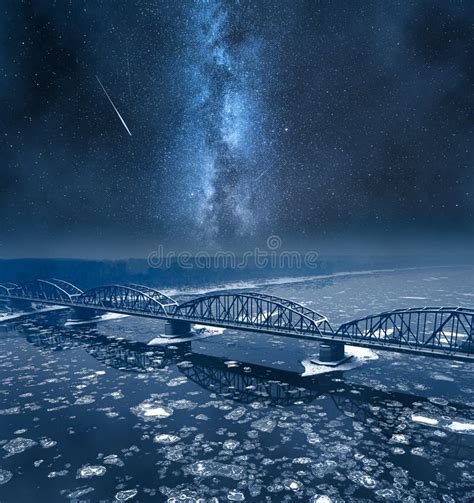 Milky Way Over River With Floes And Bridge In Winter Stock Image