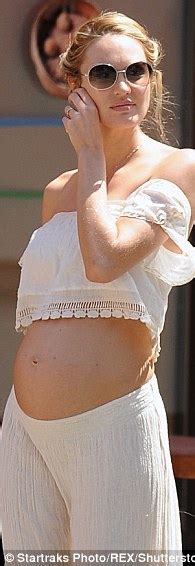 Candice Swanepoel Puts Her Bare Bump On Display In Crop Top And Sheer