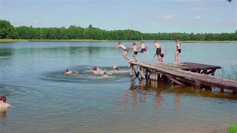 Children Swimming In Lake At Summer Vacation Stock Video Motion Array