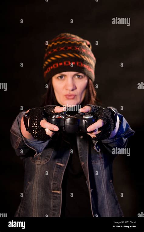 Woman Gamer With Joystick On Dark Background Stock Photo Alamy