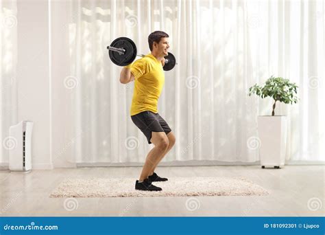 Man Exercising With Weights At Home Stock Image Image Of Athlete