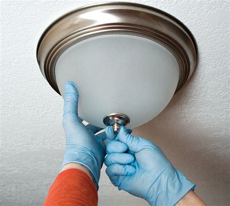It's not normally necessary to remove these screws. How to Replace a Ceiling Light Fixture in 8 SImple Steps ...