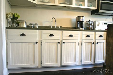 So we added beadboard to it and the. DIY Beadboard Wallpaper Cabinets - I would like to do this ...