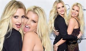 Jessica Simpson Gets A Little Cheeky With Sister Ashlee Grabbing Her On