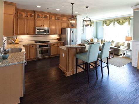 Dark flooring and cabinets with an authentic this kitchen with a dark wood island looks brilliant because the dark flooring blends in with the the dark wooden floor in this modern kitchen immediately creates a feeling of calmness and eccentricity. Amazing Designs From Showhouse Showdown | Interior Design Styles and Color Schemes for… | House ...