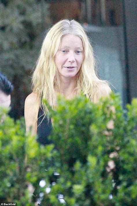 makeup free gwyneth paltrow 50 displays youthful complexion and natural gray roots for casual