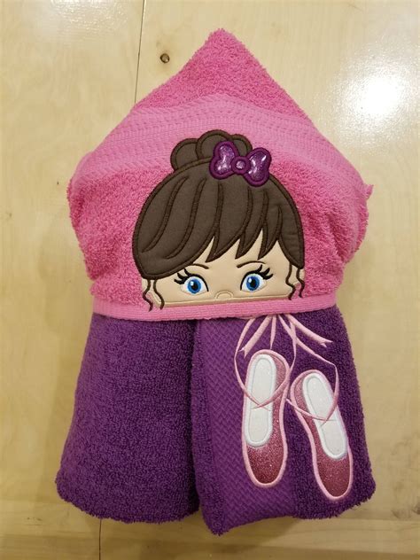 It draws moisture through direct contact. Dancer Hooded Towel with personalization by ...