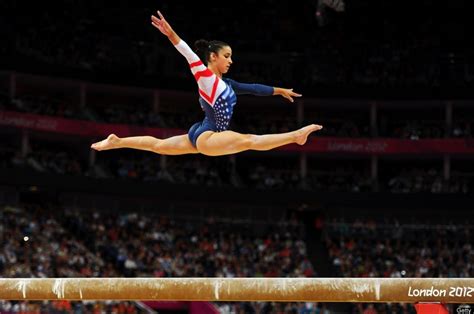 High Drama On The Balance Beam Gymnastics Skills Artistic Gymnastics