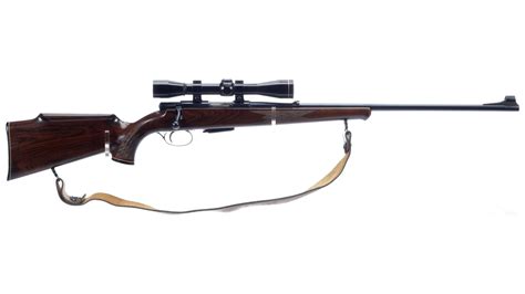 Anschutz Model 143132 Bolt Action Rifle With Leupold Scope Rock