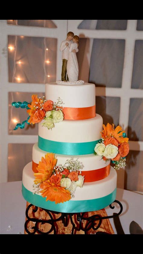 Orange And Turquoise Wedding Cake With Fresh Flowers Turquoise