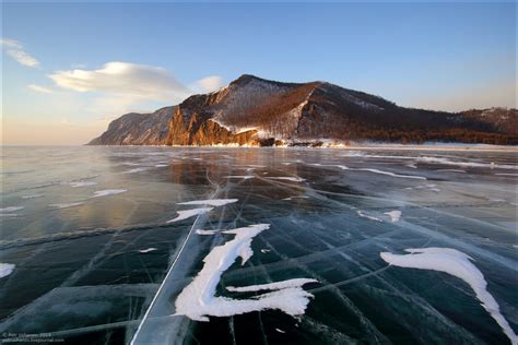 Crystal Clear Ice Of The Frozen Baikal Lake · Russia Travel Blog