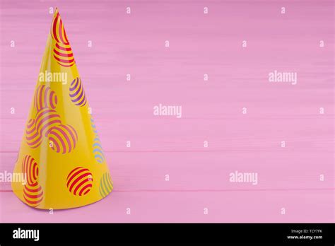 Yellow Party Hat With Copy Space Stock Photo Alamy