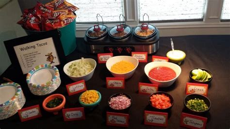 A great and easy way to feed your guests for any event! Walking Taco Bar | Graduation party ideas in 2019 ...