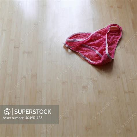 Close Up Of Panties On The Floor Superstock