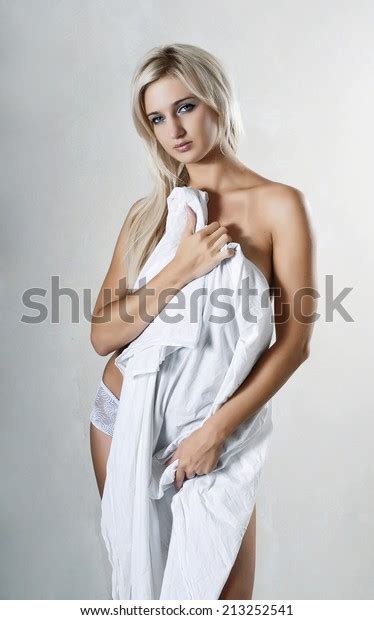 Naked Woman Covered With A Sheet