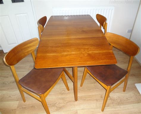 Wood dinner table with upholstered bench. Antiques Atlas - Mid Century 1960s Table & Chairs