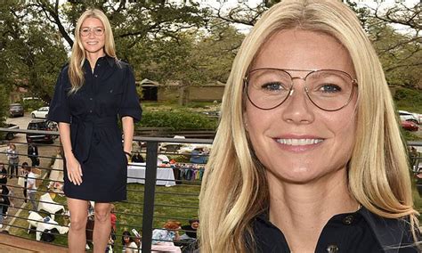 Gwyneth Paltrow Cuts A Chic Figure In Belted Navy Dress With Her