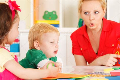 Pre School Children In The Classroom With The Teacher Stock Photo By