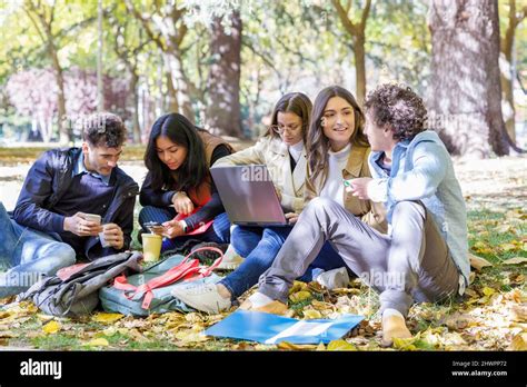 Multiracial Students Spending Leisure Time On University Campus Stock