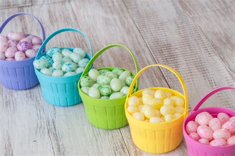 Pastel Jelly Beans In Colored Baskets For Easter Stock Image Image Of
