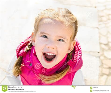 Cute Little Girl Smiling In A Park Stock Photos Image