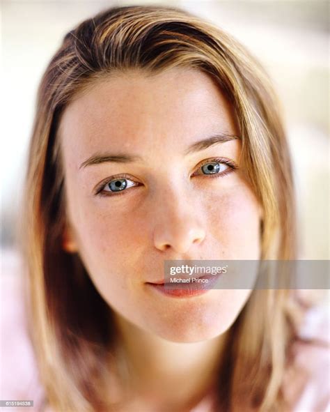 Smiling Young Woman High Res Stock Photo Getty Images