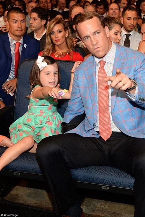 Peyton Mannings Daughter Mosley Clings To His Leg At The 2015 Espys