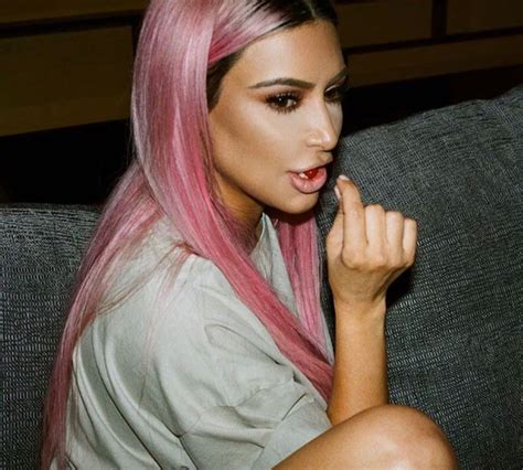 kim kardashian with pink hair and dark roots in japan pinkhair kardashian hair jenner hair