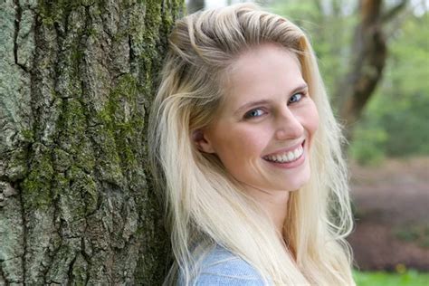 Beautiful Blond Woman Smiling In The Forest Stock Image Everypixel