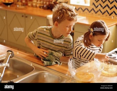 Children In Kitchen Stock Photo Alamy