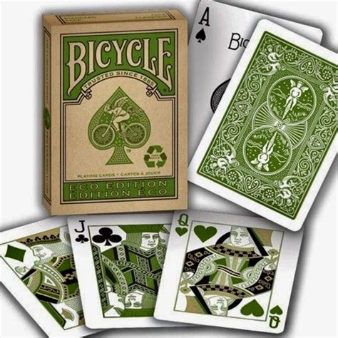 The Bicycle Playing Cards Are Green And Have Four Different Designs On