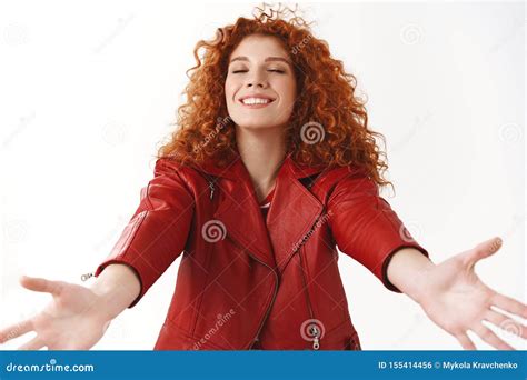 Cheerful Lovely Dreamy Redhead Curly Haired Woman Modern Stylish Red Jacket Extend Arms Close