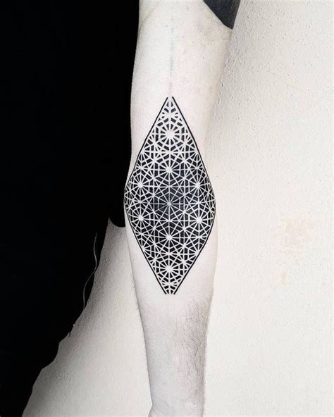 Geometric Negative Space Rhombus Tattoo On The Left Forearm Elegant
