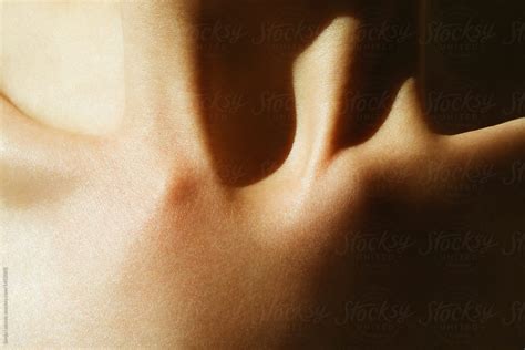 Clavicle Bone Closeup In The Light And Shadow By Stocksy Contributor