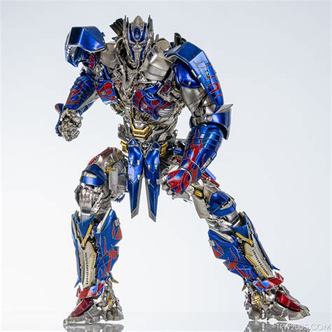 Threezero Dlx The Last Knight Optimus Prime In Hand Gallery