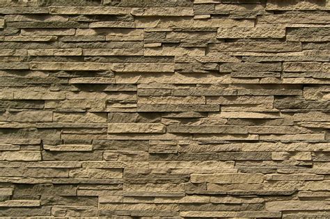 These faux stone panels have been used on commercial and residential remodels. StoneWorks Faux Stone Siding - Stacked Stone Stony Gray ...