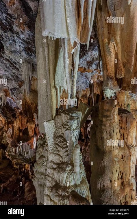 Formation Of Stalactites And Stalagmites Inside An Ancient Cave Stock