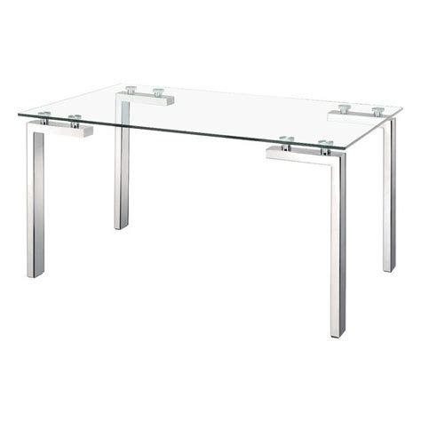 The Dining Table Has Strong Architectural Lines In Its Design Made With A Clear Tempered Glass