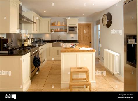 Home Interior Small Contemporary Fitted Kitchen With Island Unit Stock