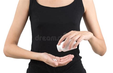 Closeup Woman Hand Pouring White Pills Into Her Hand Stock Image