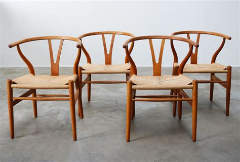 Set Of Four Oak Ch24 Wishbone Chairs By Hans J Wegner For Carl Hansen 1960 105682