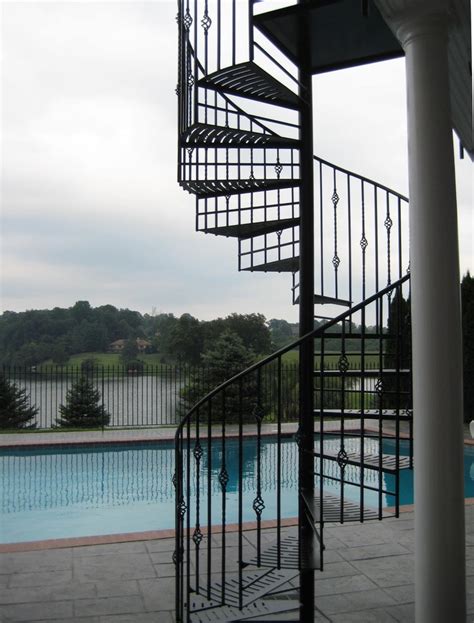 Spiral Staircase From Deck To Pool Patio In Forest Virginia By