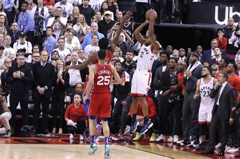 Kawhi leonard and his teammates watch as the ball bounces around the rim before falling through as time expires sunday in game 7. Kawhi Leonard Game 7 Buzzer Beater Lifts Raptors Over ...
