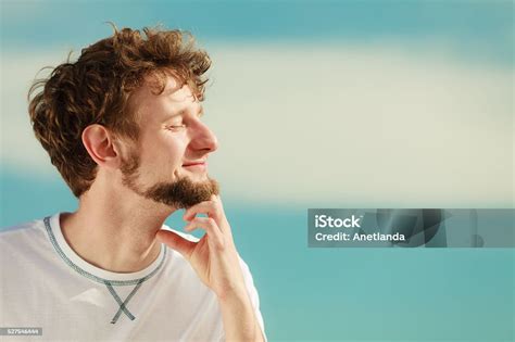 Man With Closed Eyes Relaxing Breathing Fresh Air Stock Photo