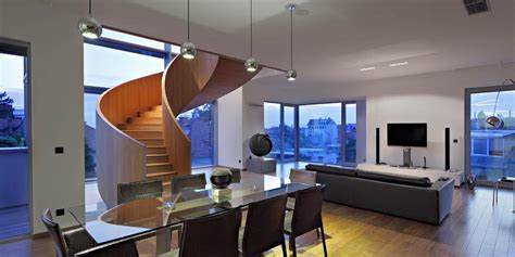 Concrete Circular Stairwell Focus Of Minimalist Residence