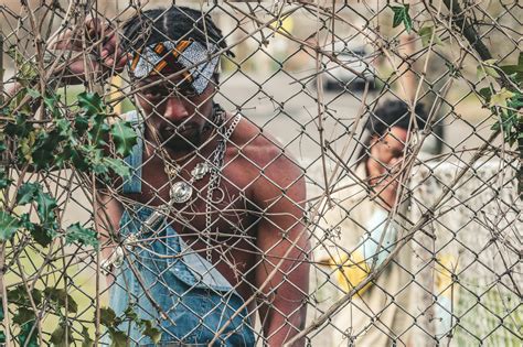 Man Behind A Fence · Free Stock Photo